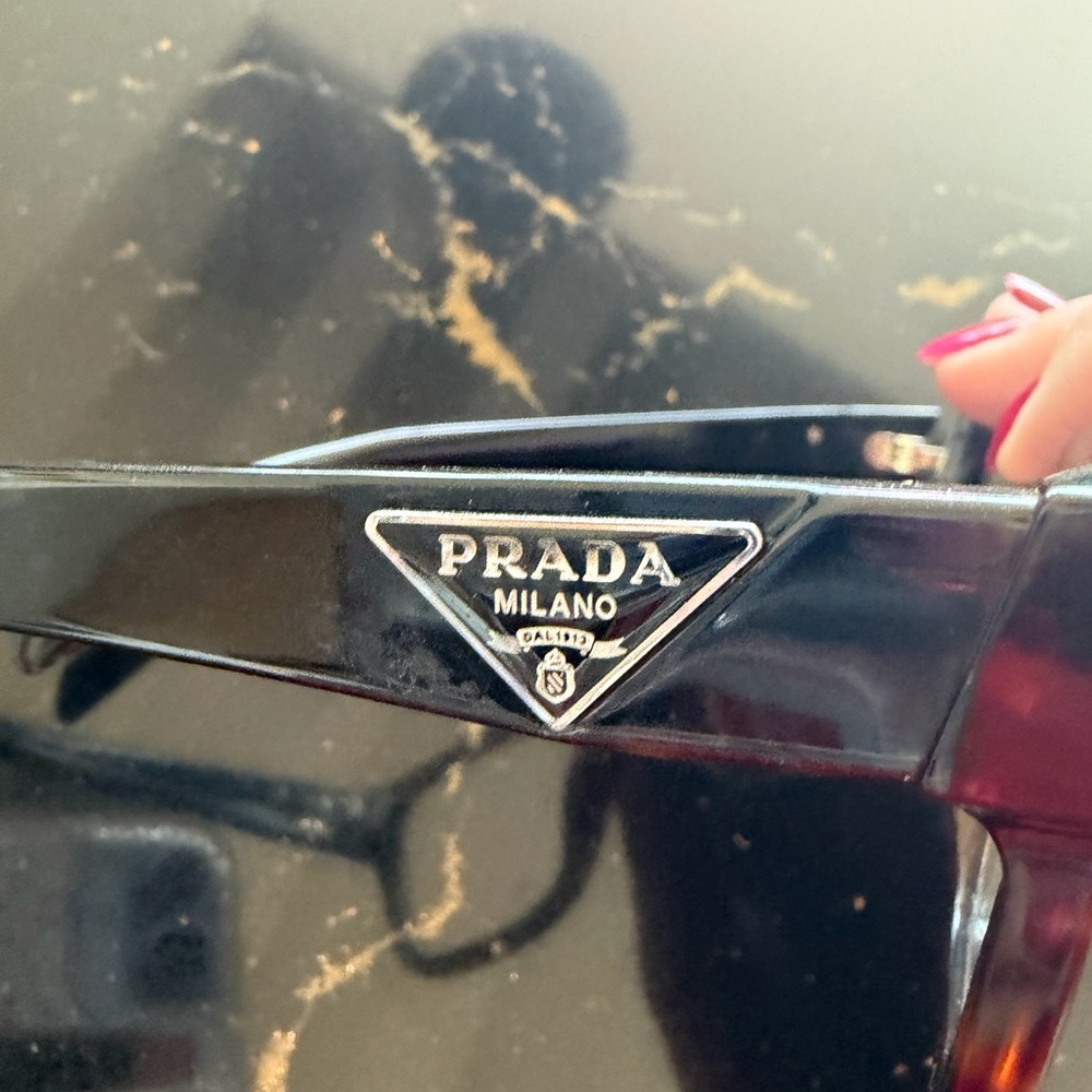 Prada tortoise frame eye glasses